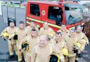 Largs firefighters were pictured in new gold and yellow kit with French-style galet hat, tunic and trousers. The change follows a £3 million initiative seeking greater protection for firefighters.