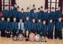 BATTALION boys: The boys from 1st Largs Boys Brigade company section are pictured here with their winning cups and medals for various battalion competitions