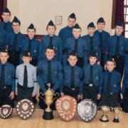 BATTALION boys: The boys from 1st Largs Boys Brigade company section are pictured here with their winning cups and medals for various battalion competitions
