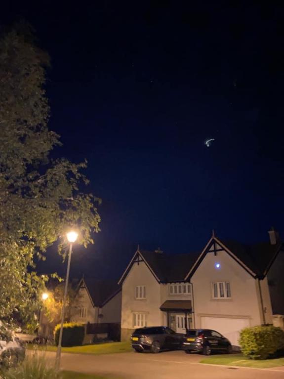 Largs and Millport Weekly News: The set of lights could be seen above the housing estate Largs and Millport Weekly News: The set of lights could be seen above the housing estate