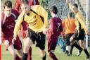 John Robertson, and Craig McGlone in action in 2006 at Barrfields
