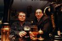 Ellis Sherwood (left) and Michael O'Brien enjoy in a drink in a Cardiff pub after being released