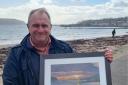Talented artist auctions special painting for Millport Town Hall