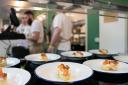 Service sector firms saw growth continue last month, according to industry data (Joe Giddens/PA)