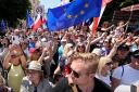People joined an anti-government march in Warsaw (Czarek Sokolowski/AP)