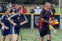 Dancing referee leads Scottish girls on to pitch