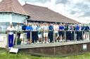 Participants lined up for the annual village golf day