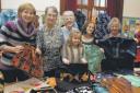 Under wraps: The st John’s Church africa project’s coffee  morning held in dunn Memorial Hall in Largs proved popular with a  surprise array of gifts to raise funds for the third world