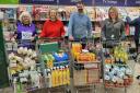 Cathie and Wendy from the Largs Foodbank pictured with Store Manager Mark Connelly and Community Champion Lorraine Nicol