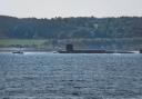 A submarine passes Cumbrae on the Firth of Clyde