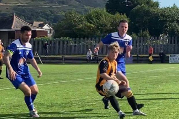 Owen in action against Rob Roy earlier this season