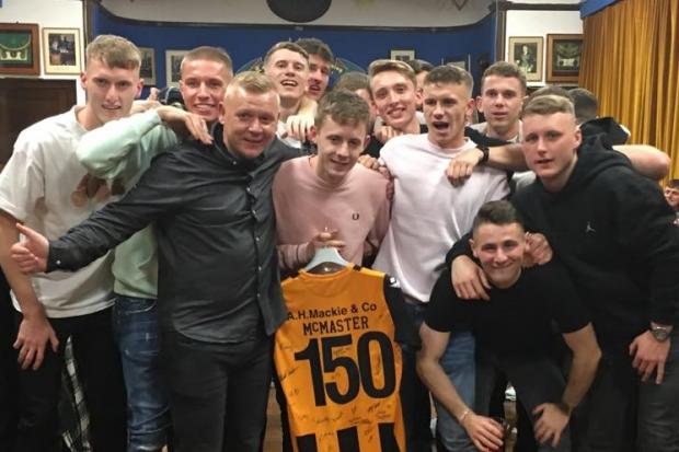 Race night ... Thistle management and players with Laurie McMaster after his 150th appearance for club against Blantyre recently