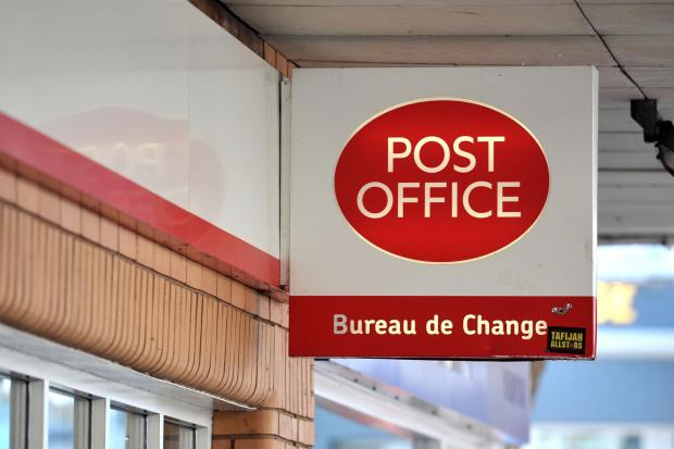 Largs and Millport Weekly News: Post Office sign. Credit: PA