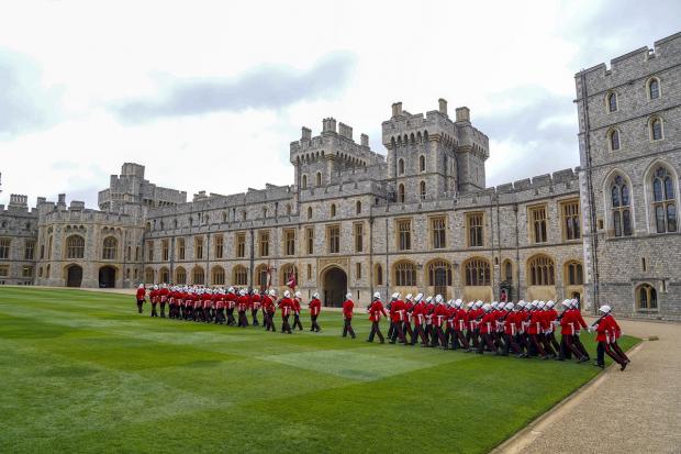 Largs and Millport Weekly News: The Earl of Wessex presents new colours to the Royal Gibraltar Regiment during a ceremony at Windsor Castle. Picture: PA