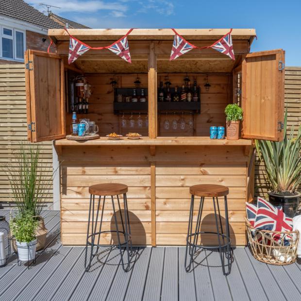 Largs and Millport Weekly News: Wooden Shiplap Garden Bar. Credit: The Range