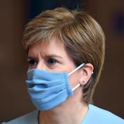 Nicola Sturgeon has imposed a travel ban  between Scotland and Manchester