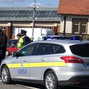 Film crew at Wemyss Bay train station with fake police