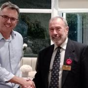 Gary Ennis (left) from Largs is welcomed by Alex Blair, President of the Rotary Club of Hunterston.