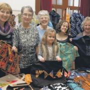 Under wraps: The st John’s Church africa project’s coffee  morning held in dunn Memorial Hall in Largs proved popular with a  surprise array of gifts to raise funds for the third world