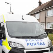 A police presence has remained in Alexander Avenue in Largs as officers continue to investigate the murder of Alan Lawson