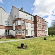 The lovely three-bedroom flat is located on Kelvin Walk in Nethethall