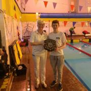 Club President Margaret Ann Dickson presents Andrew with his trophy for Best 14 year old Boy