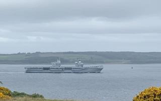 HMS Queen Elizabeth sails past Cumbrae
