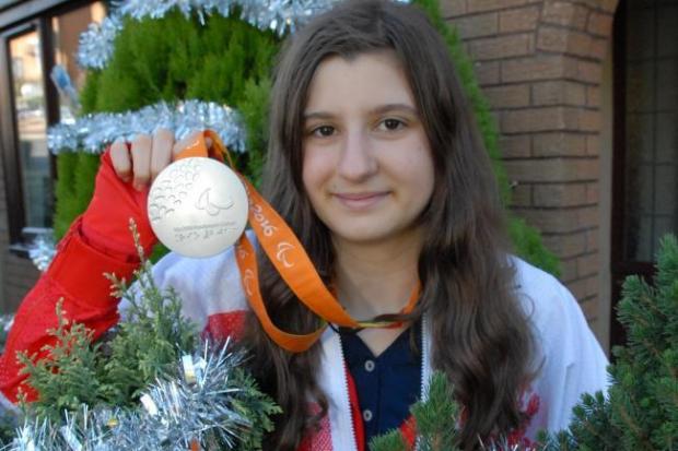 Abby pictured with her silver medal from the Rio Paralympics.
